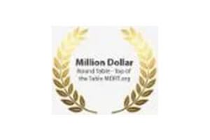 A gold laurel wreath with the words " million dollar round table-top of the table merit. Org."