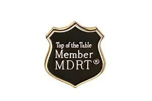 A badge that says top of the table member mdrt